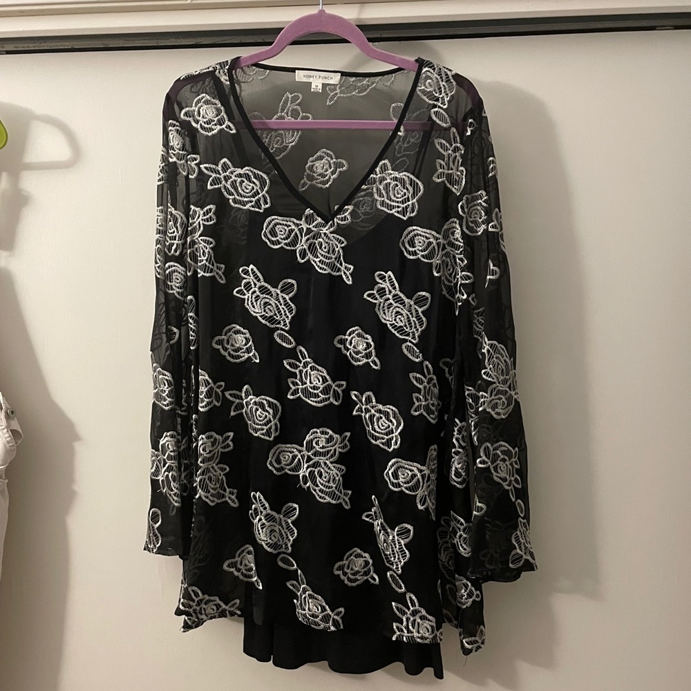 Black and white embroidered dress.